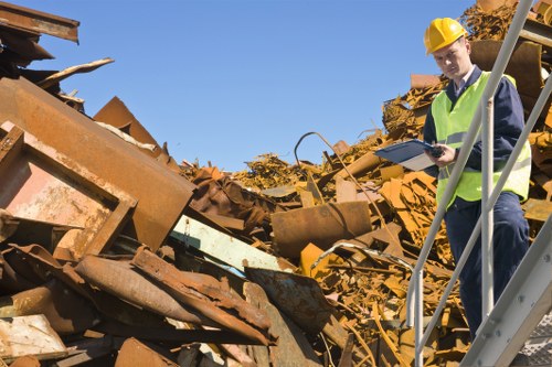 Various types of waste being sorted for recycling in Turnham Green