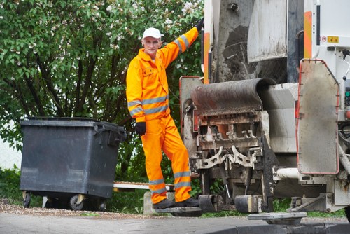 Professional rubbish removal team handling waste in Turnham Green